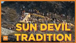 ASU students brave heat to paint A Mountain logo