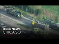 Rollover crash oil spills closes west suburban ramp on I-290