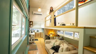 Her gorgeous Tiny House design w/ a stand-up loft!