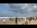 U S Marine Corps -22B Osprey puts on a show for Aussie Beachgoers