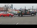 Tow Truck in Action at BJ s Wholesale Parking Lot Vehicle Removal in NYC