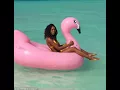 Bikini-clad Naomie Harris shows off her impressive abs