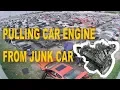 A Junkyards Near Me - Guys Pull An Engine From A Car