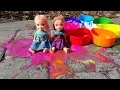 Paintballs Elsa and Anna toddlers playing with colors - water fun