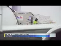Last-minute holiday shipments keeping FedEx busy