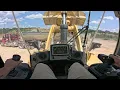 CAT 972M Stockpiling 57 s and Loading Trucks