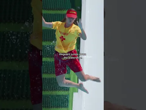 ever seen a lifeguard go down the slide like this?