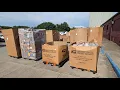 Backlog makes for a mess as unsecured packages line the parking lot at the Harvest post office
