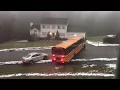School bus slides down icy road in Massachusetts crashes into car
