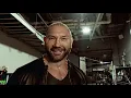 Triple H battles Batista in a No Holds Barred Match at WrestleMania