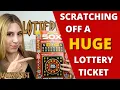 SCRATCHING OFF A HUGE LOTTERY TICKET