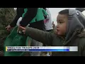Soldiers in Missouri wait in line for donated Christmas trees