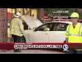 Child adult injured after car crashes into Dollar Tree in East Hartford