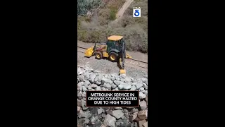 Metrolink service in Orange County halted due to high tides