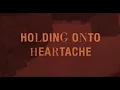 Download Lagu Louis Tomlinson - Holding On To Heartache (Official Audio)