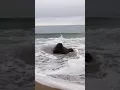 Cliffs and high tide at East Beach Santa Barbara