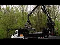 csx unloading railroad ties in the rain at the Kingsport hold out in Kingsport TN 2023