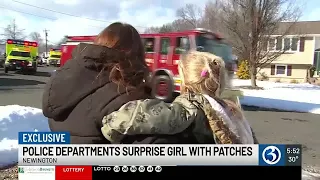 EXCLUSIVE Police departments surprise girl with patches