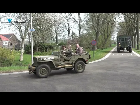 Konvooi militaire voertuigen door Nieuwleusen