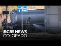 Fatal tanker truck crash spreads fuel beneath I-25 in Denver