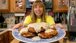 Breaded Southern Fried Pork Chops Smothered in Skillet Gravy -The Hillbilly Kitchen #cooking #recipe