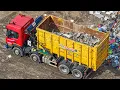 Scrap Yard Giants at Work Crushing Cars Shredding Metal Recycling Plastics