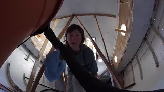 Girl Works on Putting up Cieling Ribs : Pacific Seacraft