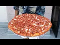This MOUNTAIN-SIZED Pizza Comes With Over TWO HUNDRED Pepperonis