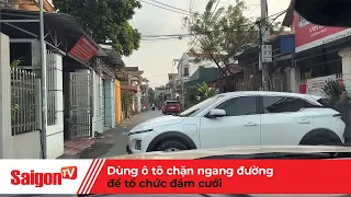 Dùng ô tô chặn ngang đường để tổ chức đám cưới | Tin tức SaigonTV