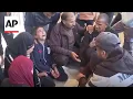 Lagu Palestinians mourn after at least 8 killed in Israel strikes in Gaza Strip