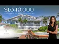 STUNNING ELEVATED CUSTOM-BUILT CONTEMPORARY HOME ON 107 FT OF WATERFRONT IN NORTH REDINGTON BEACH!!