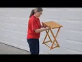 She grabs an old TV tray in her garage for this GENIUS living room idea