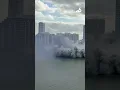 shows implosion of Mandarin Oriental Miami hotel on Brickell Key