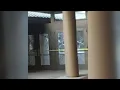 Photo shows broken windows at Bowie High School police investigate