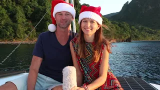 Mrs. Santa on the top of the mast of a trimaran!!!