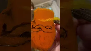 Painting the lorax on my mirror