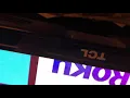 The power button on a TCL Roku TV