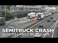 Semitruck crash on I-5 north near I-405 split causes massive traffic backup