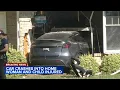 Woman child injured after car crashes into home in Bear Delaware