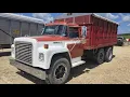 Browsing an auction with cheap old equipment Tractors heavy equipment grains trucks and more