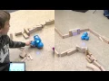 A 4th grader programs Dash to solve a maze