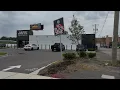 Flock Camera Removed Sign Reading No Flock Zone Up Outside Cannabis Dispensary in Michigan