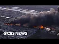 shows massive fire from UPS plane crash in Louisville Kentucky