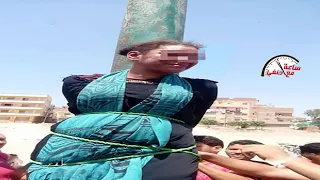 بالفيديو اهالى الشرقيه يربــ طــ ـون سيده فى عمود النور بس اللى عملته  بالفيديو اهالى الشرقيه يربــ طــ ـون سيده فى عمود النور بس اللى عملته