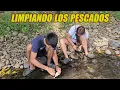 Lagu Limpiando los pescados en el rio.