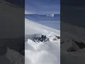 Clearing tons of snow one scoop at a time