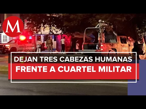 Download MP3 Dejan cabezas humanas y mensaje frente a un cuartel militar de Cancún