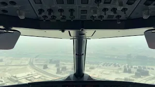 Landing in Dubai: A Cockpit View on Runway 12L. DXB