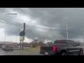 Tornado down it s on the ground shows dark grey clouds near ground in Pontiac IL