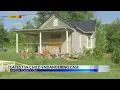 New details after four people charged 16 children removed from home
